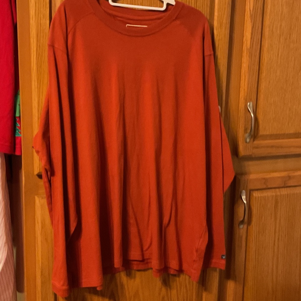 Gently used  men’s rust colored long sleeve T-shirt by the north face size 2 XL